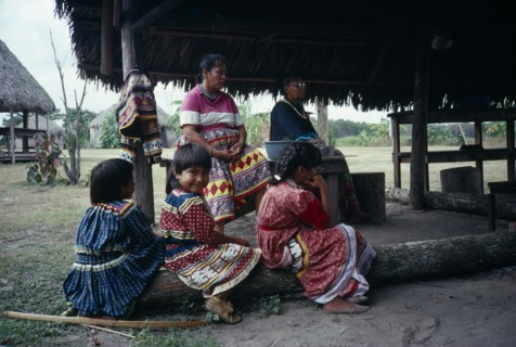 USA, Florida, Everglades, Independent Seminole Native American village. Family of women and young