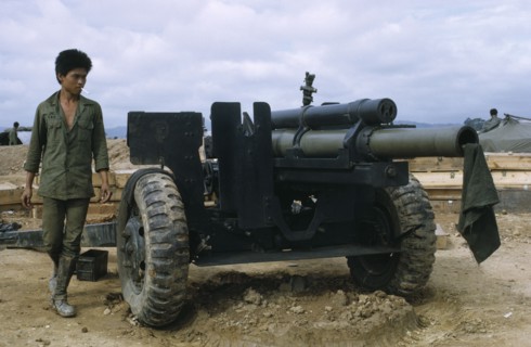 VIETNAM, Central Highlands, Kontum, Vietnam War. Siege of Kontum. Montagnard soldier next to a