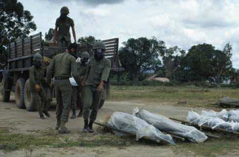 VIETNAM, Central Highlands, Kontum, Vietnam War. Siege of Kontum. Montagnard soldiers wearing gas