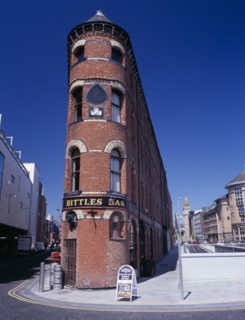 IRELAND, North, Belfast, "Bittles Bar, brick exterior facade, A-board advertising menu and beer