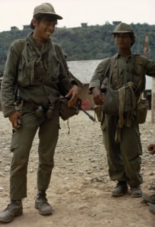 LAOS, Xianghoang, War, "Meo soldiers carrying guns and grenades, members of the CIA army under Gen.