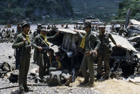 LAOS, Xiangkhoang, ??? , "Meo soldiers gathered around an American plane shot down over Pathet Lao