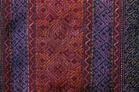 BANGLADESH, Crafts, Textiles, Detail of red and purple woven murang pinon or loin cloth.