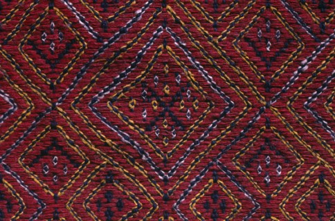 BANGLADESH, Crafts, Textiles, Detail of red and blue embroidered murang pinon or loin cloth.