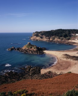 UNITED KINGDOM, Channel Islands, Jersey, St. Brelade. Portelet Bay with Isle au Guerdain a tower