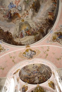 GERMANY, Bavaria, Oberammergau, The Town Church. Interior with frescos on ceiling and main altar.