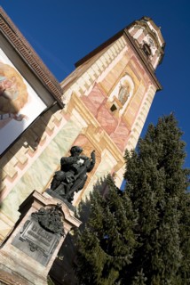GERMANY, Bavaria, Mittenwald, "Pfarrkirche St Peter and Paul. Bell tower with statue of Mathias