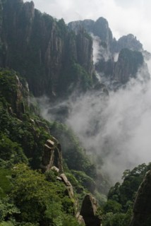 CHINA, Anhui Province, Huang Shan , Huangshan or the Yellow Mountain. Rock peaks with lush green