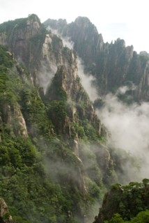CHINA, Anhui Province, Huang Shan , Huangshan or the Yellow Mountain. Rock peaks with lush green