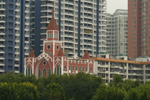 CHINA, Hubei , Wuhan, The Catholic Cathedral among modern apartment blocks