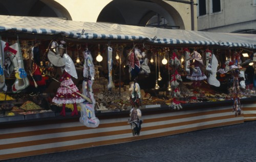 ITALY, Veneto, Padua, Puppets of New Year witch La Befana on street stall in Piazza del Erbes. La