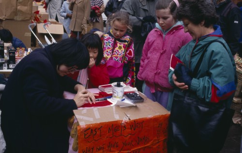 ENGLAND, London, Chinese New Year, Calligraphist writing Western names in Chinese during New Year