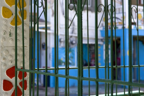 WEST INDIES, St Vincent And The Grenadines, Union Island, Green metal caging on a building in a