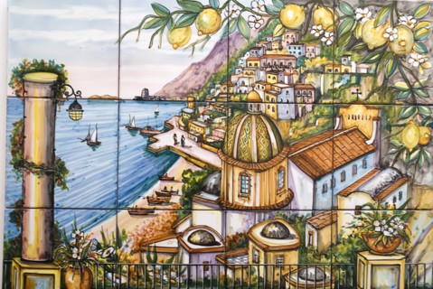 20093628 ITALY Campania Positano Close up of an ornamental tile showing central Positano and its church
