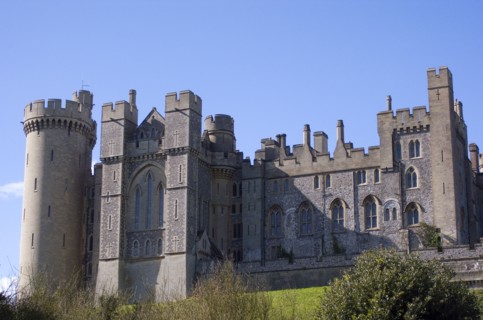 ENGLAND, West Sussex, Arundel, View of the castle from the river bank.