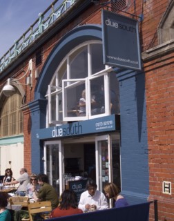 ENGLAND, East Sussex, Brighton, Due South restaurant in the arches underneath the promenade.