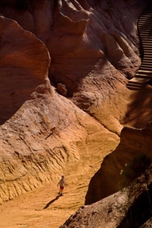 FRANCE, Provence Cote d’Azur, Le Sentier des Ocres (The Ochre Footpath) , "Small boy playing on