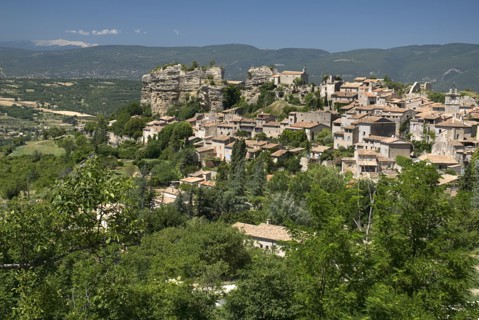 FRANCE, Provence Cote d’Azur, Vaucluse, "Saignon.  Provencal hilltop village with Mont Ventoux seen