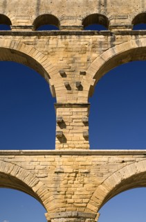 FRANCE, Provence Cote d’Azur, Gard, Pont du Gard.  Close up detail of section of the three tiers of