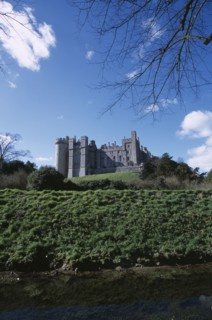 ENGLAND, West Sussex, Arundel, Arundel Castle viewed from the riverbank.