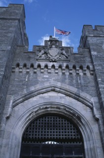 ENGLAND, West Sussex, Arundel, Arundel Castle. Part view of the entrance gate and crenelated towers