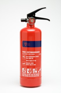 INDUSTRY, Health and Safety, Fire, A red ABC category powder fire extinguisher on a white