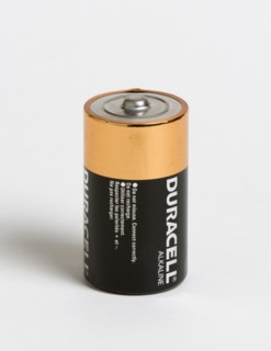 INDUSTRY, Power, Electric, An alkaline battery on a white background