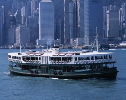 CHINA, Hong Kong, Victoria Harbour, "Star Ferry crossing Victoria Harbour, high rise city buildings