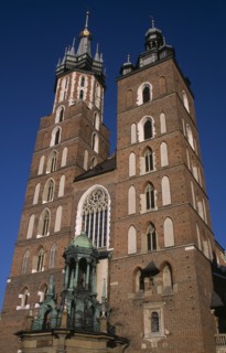POLAND, Krakow, Mariacki Basilica or Church of St Mary.  Gothic  red brick exterior built in the