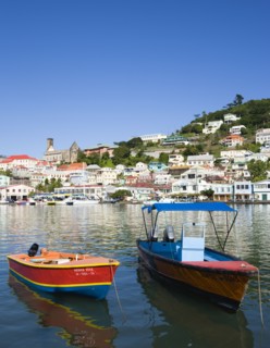 WEST INDIES, Grenada, St George, Water taxi boats moored in the Carenage harbour of the capital