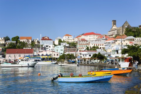 WEST INDIES, Grenada, St George, Water taxi boats moored in the Carenage harbour of the capital