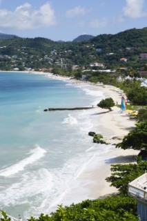 WEST INDIES, Grenada, St George, Waves of the aquamarine sea breaking on the two mile stretch of