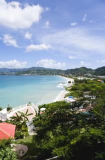 WEST INDIES, Grenada, St George, Waves of the aquamarine sea breaking on the two mile stretch of