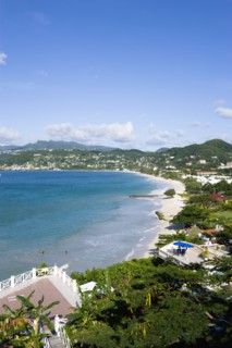WEST INDIES, Grenada, St George, Waves of the aquamarine sea breaking on the two mile stretch of