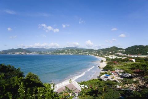 WEST INDIES, Grenada, St George, Waves of the aquamarine sea breaking on the two mile stretch of