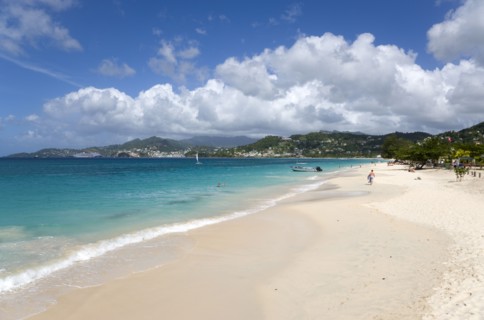 WEST INDIES, Grenada, St George, Waves of the aquamarine sea breaking on the two mile stretch of