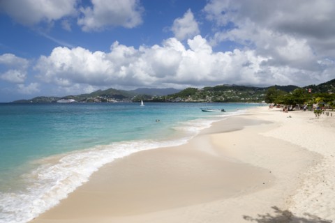 WEST INDIES, Grenada, St George, Waves of the aquamarine sea breaking on the two mile stretch of