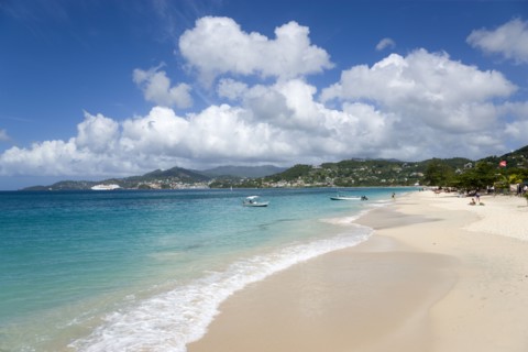 WEST INDIES, Grenada, St George, Waves of the aquamarine sea breaking on the two mile stretch of