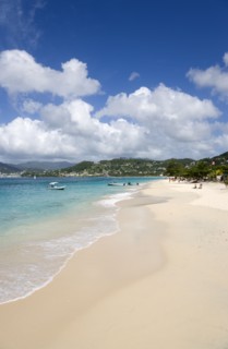 WEST INDIES, Grenada, St George, Waves of the aquamarine sea breaking on the two mile stretch of