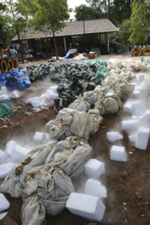 THAILAND, Phang Nga District, Takua PA, "Tsunami. Dry ice blocks lay around the bodies to try and