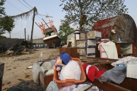 THAILAND, Phang Nga District, Nam Khem, "Tsunami. Childrens toys ly piled up and Boats have been