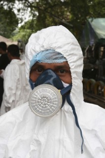 THAILAND, Phang Nga District, Takua Pa, "Tsunami. Forensic people and volunteers have to wear masks
