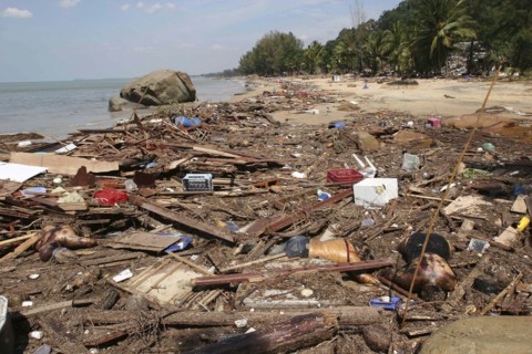 THAILAND, Phuket, "Tsunami. Bodies lay mixed with all the debris on the beach caused by the