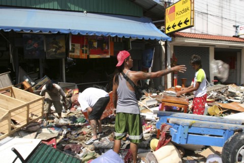 THAILAND, Phang Nga District, Phuket, "Tsunmai carnage the day after. What is left of Patong on the