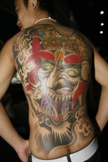 THAILAND, Phuket, Tattoo on mans back.