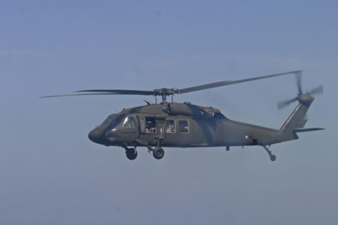 THAILAND, Phuket, "Tsunami. A helicopter in flight with rescue workers are flown from Phuket to