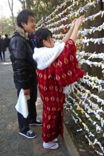 JAPAN, Honshu, Tokyo, "Jingumae - at Meijijingu shrine, couple boy and girl early twenty years old,