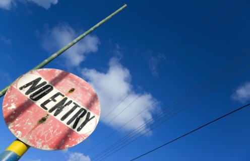 WEST INDIES, St Vincent & The Grenadines, Union Island, Colourful and weather worn No Entry road