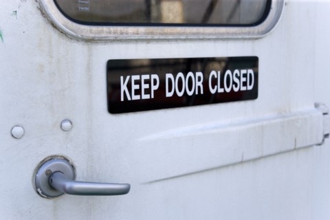 WEST INDIES, St Vincent & The Grenadines, Kingstown, Sign on a door of an inter island ferry ship