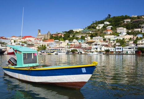 WEST INDIES, Grenada, St Georges, The Carenage in the capital with houses lining the hillside and a
